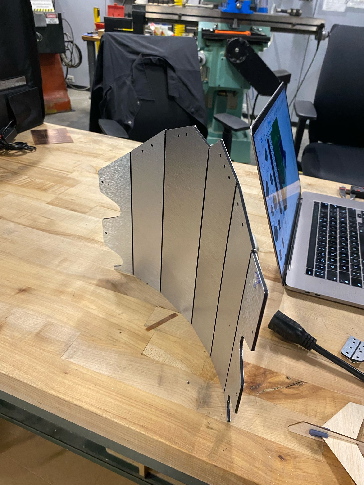 Sheet metal panel on workbench