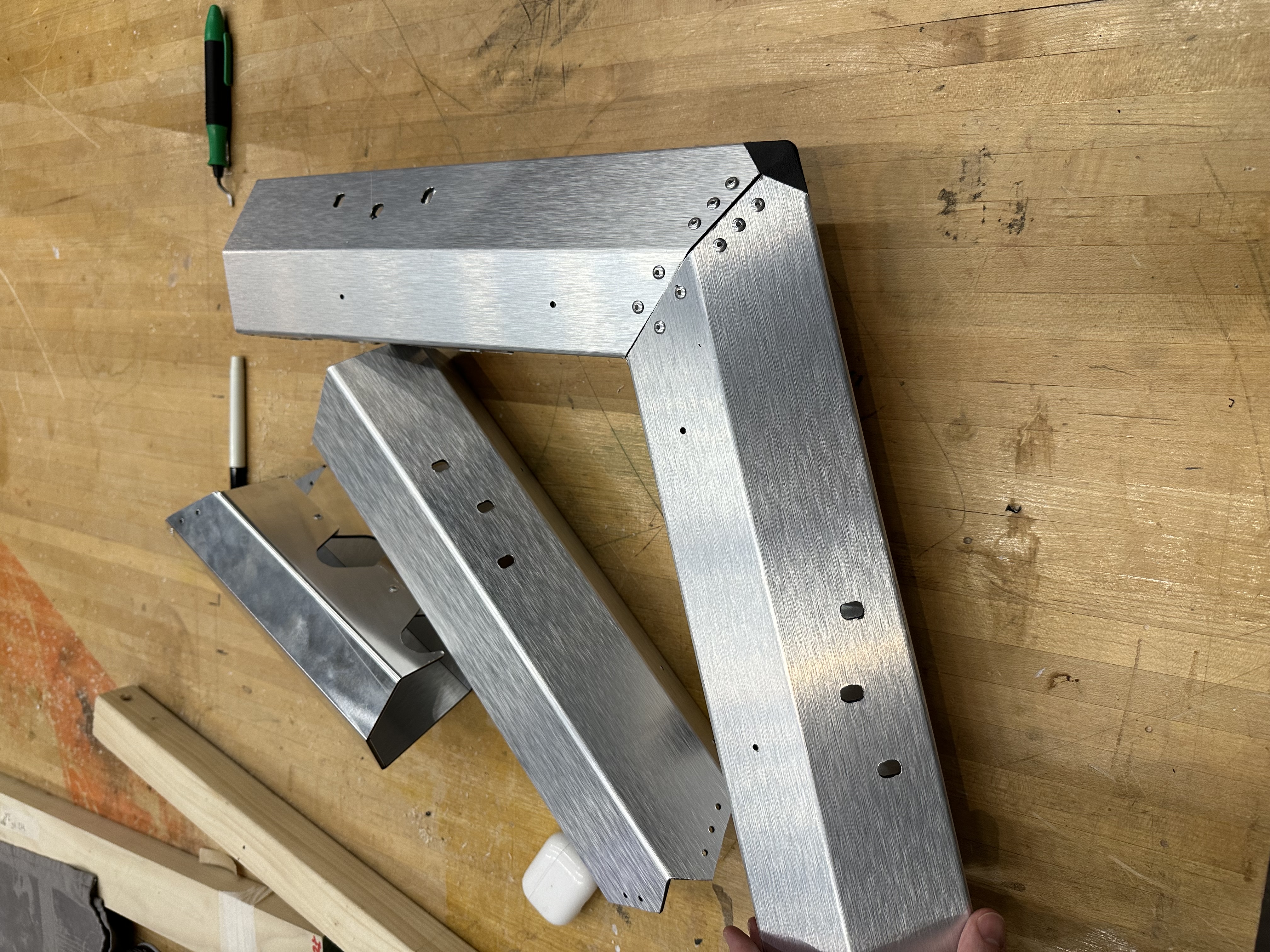 Folded aluminum strut components