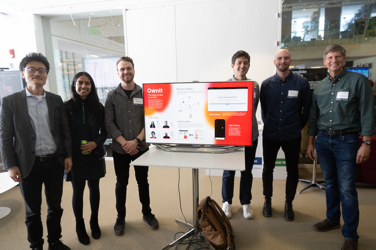 The OwnIt team with professors and investors after winning first place