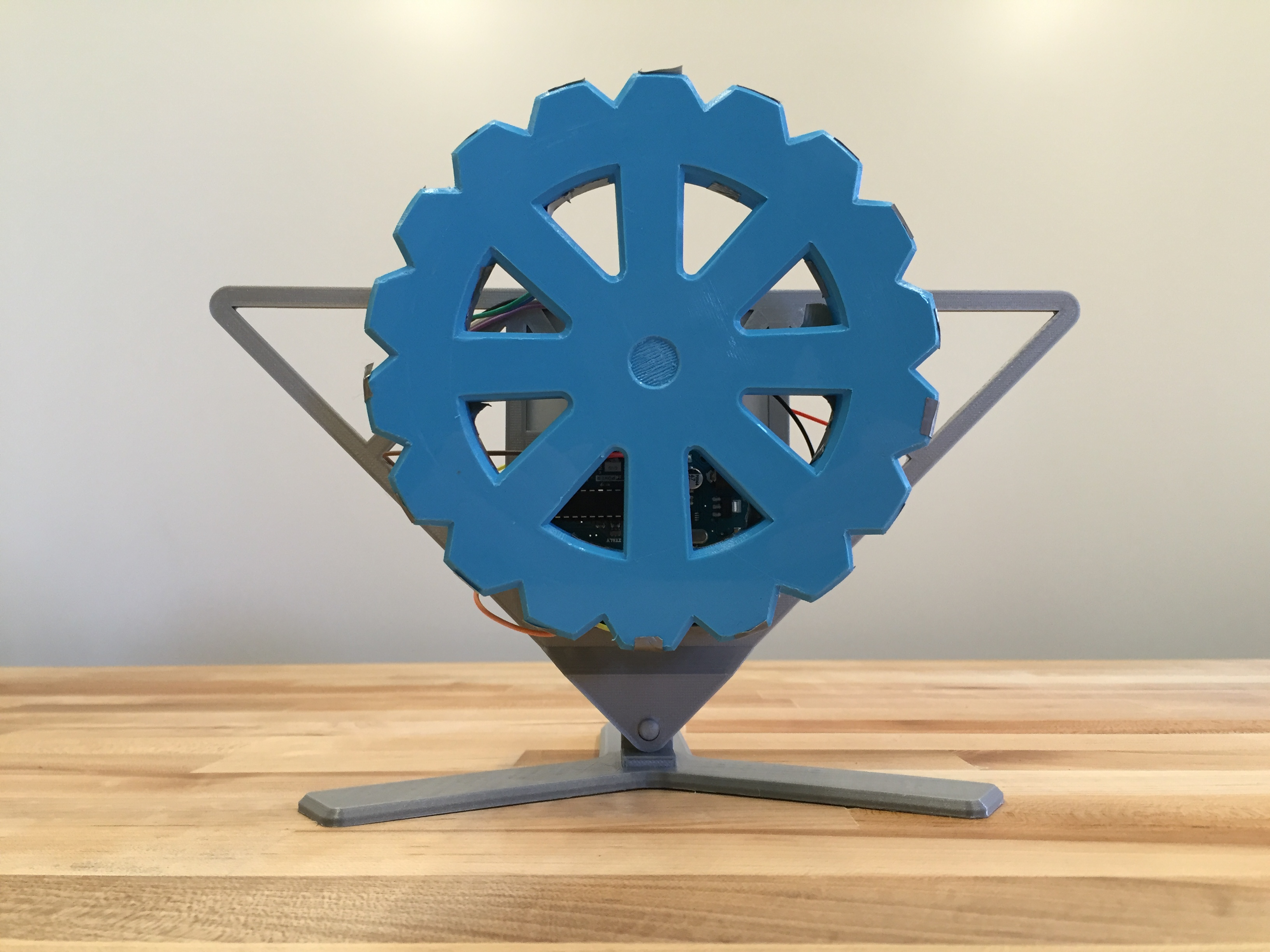 Inverted pendulum V2 with blue reaction wheel and grey 3D-printed frame